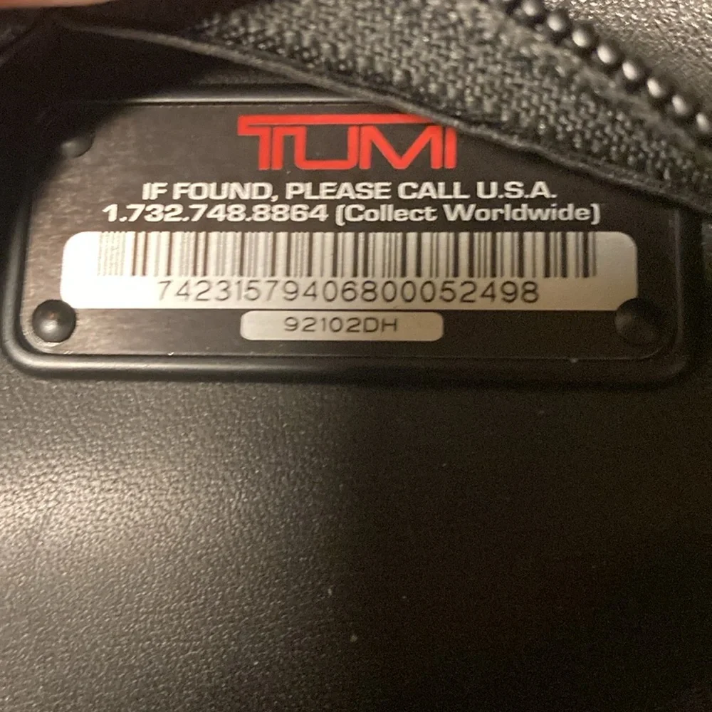 Tumi Black sholder travel-bag